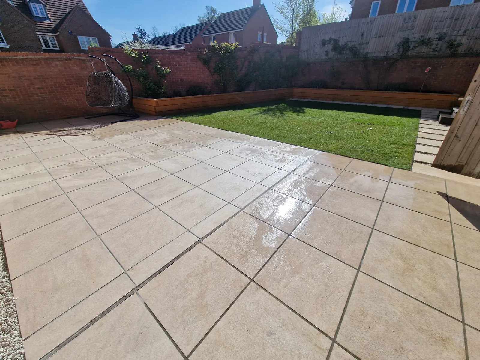 Cream patio with green lawn - Reading